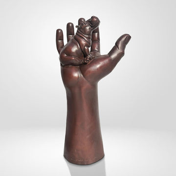 A Hippo up High in a Hand (Bronze Sculpture)