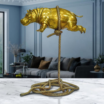 Flying Golden Hippo on Short Rope (Bronze Sculpture)