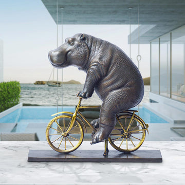 The Hippo Races Against Time on the Bicycle (Bronze Sculpture, Small)