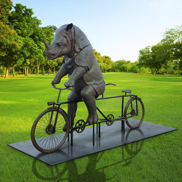 The Javan Rhino Races on the Bicycle (Bronze Sculpture)