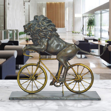 The Lion Races Against Time on the Bicycle (Bronze Sculpture, Small)