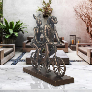 Rabbitwoman and Dogman Take Love for a Spin (Resin Sculpture)