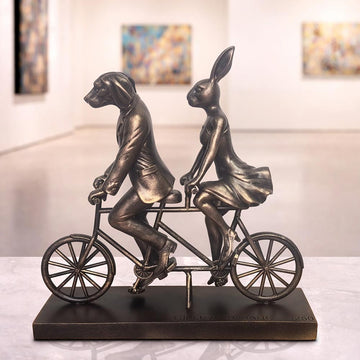 Rabbitwoman and Dogman Take Love for a Spin (Resin Sculpture)