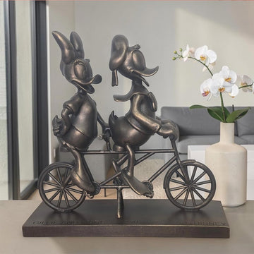 Daisy and Donald Take Love for a Spin (Resin Sculpture)