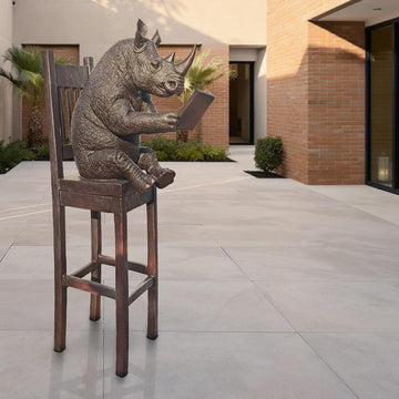 Rhino Above It All, Lost in a Good Story (Bronze Sculpture, Mid-Size)