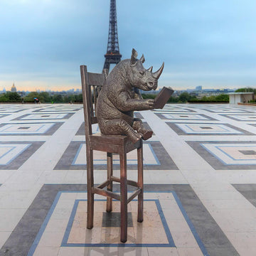 Rhino Above It All, Lost in a Good Story (Bronze Sculpture, Mid-Size)
