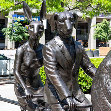 He Was on a Ride to a Safer Place with Rabbitwoman and Dogman (Bronze Sculpture)