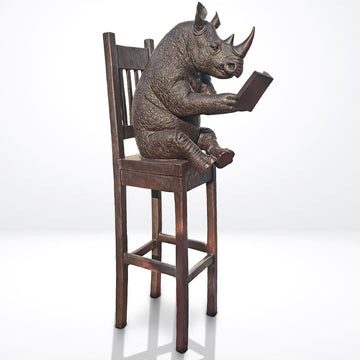 Rhino Above It All, Lost in a Good Story (Bronze Sculpture, Mid-Size)
