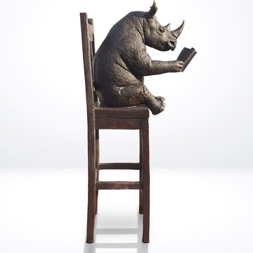 Rhino Above It All, Lost in a Good Story (Bronze Sculpture, Mid-Size)