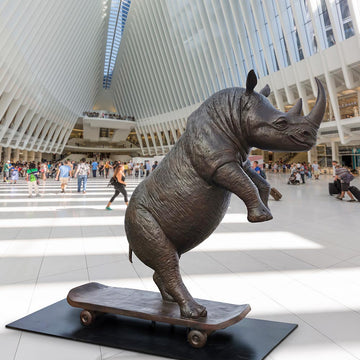 The Northern White Rhino Races on the Skateboard (Bronze Sculpture)