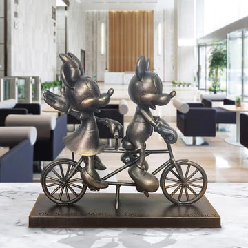 Mickey and Minnie Take Love for a Spin (Resin Sculpture)