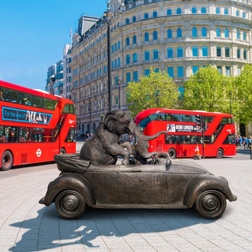 The Bengal Tiger and Sumatran Elephant Race in the Beatle (Bronze Sculpture)