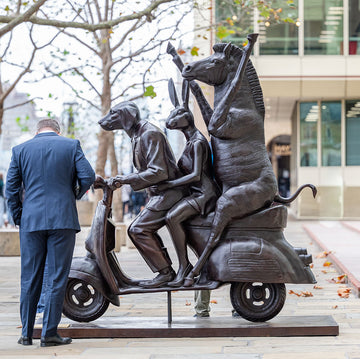 The Grevy's Zebra Was on the Move to Safer Ground with Rabbitwoman and Dogman (Bronze Sculpture)