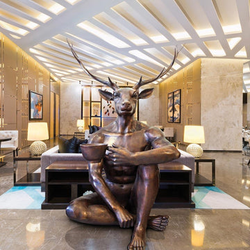 Deerman Loves his Coffee (Bronze Sculpture)