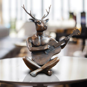He was the guitar man with horns (Bronze Sculpture)