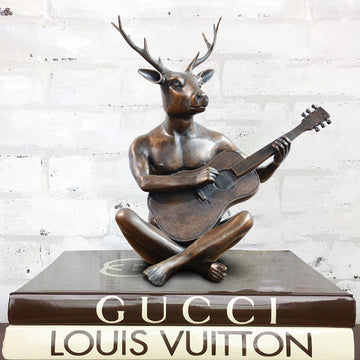He was the guitar man with horns (Bronze Sculpture)