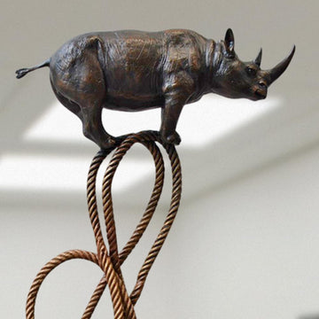 Rhino Suspended on Rope and Feeling Very Safe (Bronze Sculpture)
