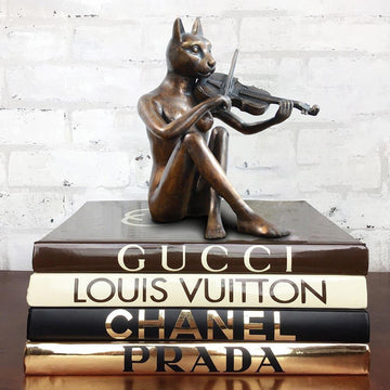 She only played the songs she wrote (Bronze Sculpture)