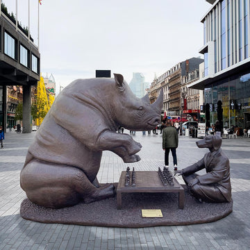 The White Rhino Was Thinking Ahead with Dogman's Encouragement (Bronze Sculpture)