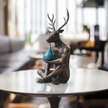 He thought about buying a new tie but he bought a pear instead (Bronze Sculpture)