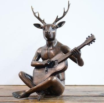He was the guitar man with horns (Bronze Sculpture)