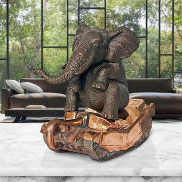 The elephant has a crush on tanks (Bronze Sculpture)