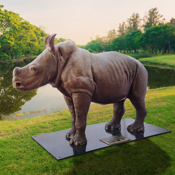 Wild Baby White Rhino (Bronze Sculpture)