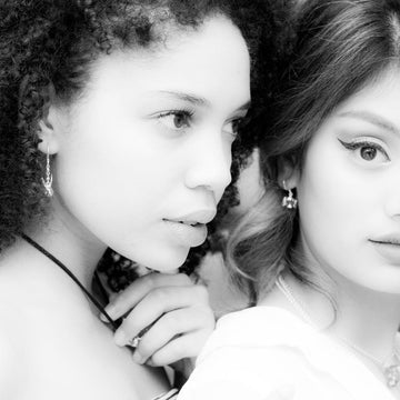 He whispered sweet nothings into her ears (Earrings)