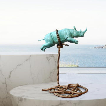 Green flying Rhino on short rope (Bronze Sculpture)