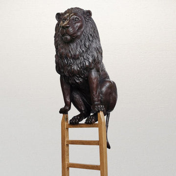 Lion reaches new heights (Bronze Sculpture)