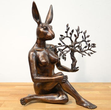 She thought she had the whole world in her hand (Bronze Sculpture)