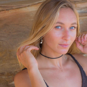 He whispered sweet nothings into her ears (Earrings)