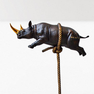 Flying Rhino on Long Rope with a Gold Horn (Bronze Sculpture)