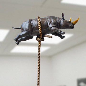 Flying Rhino on Long Rope with a Gold Horn (Bronze Sculpture)
