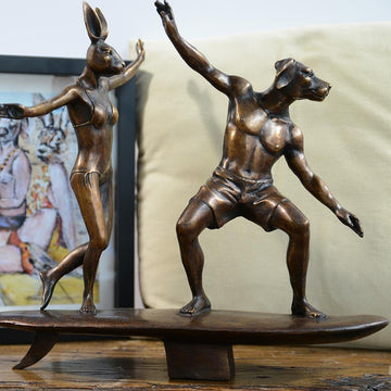 They loved riding the biggest waves in the world even though it was dangerous (Bronze Sculpture)