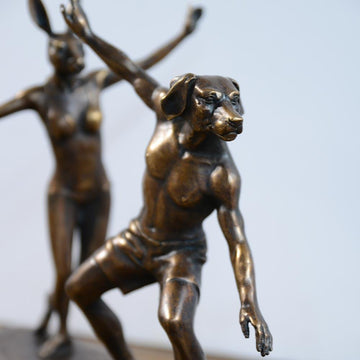They loved riding the biggest waves in the world even though it was dangerous (Bronze Sculpture)
